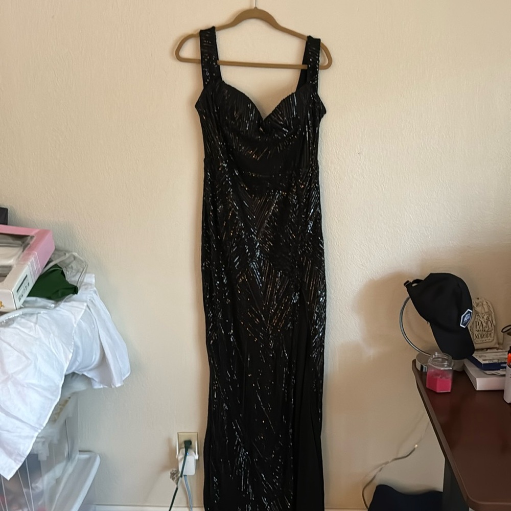 Long black sequence dress sweetheart cut with slit